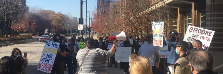 Protest in front of Zilber Hall on Wisconsin Avenue.