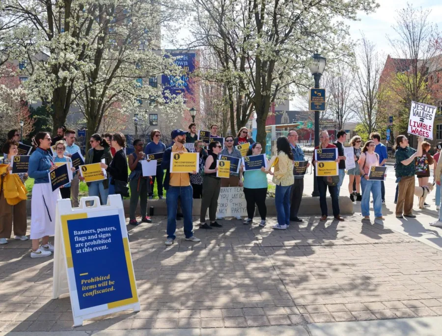 Protestors gathered on the northeast corner of 12th Street and Wisconsin Avenue during Ah Yun’s inauguration.